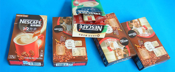 半自动高速装盒机包装纸盒.jpg 14684783789280775.jpg